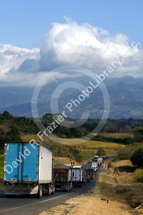 Traffic along the Pan American Highway CR1 just west of San Jose, Costa Rica.