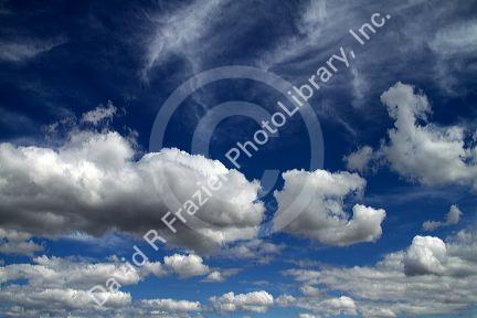 Cumulus and cirrus clouds with blue sky over Idaho, USA.