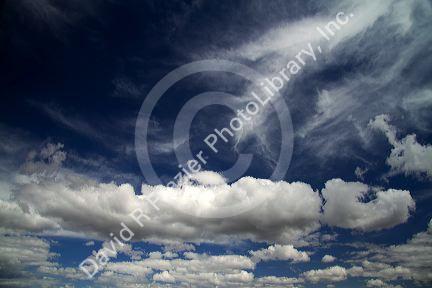 Cumulus and cirrus clouds with blue sky over Idaho, USA.