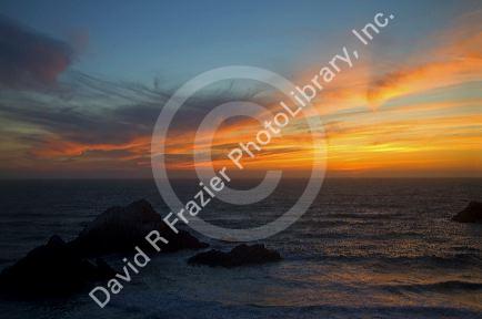 View of the Pacific Ocean at sunset from the Cliff House near San Francisco, California, USA.