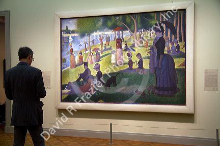 A Sunday Afternoon on the Island of La Grande Jatte by Georges Seurat displayed at the Art Institute of Chicago, Illinois, USA.