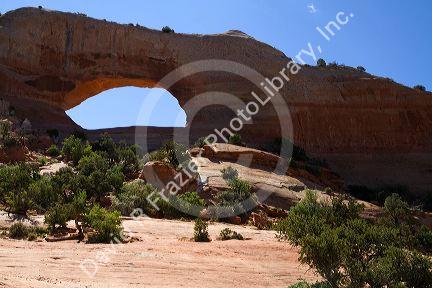 Wilson Arch is a natural sandstone arch along U.S. Route 191 near Moab, Utah, USA.