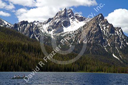Canoeing on Stanley Lake in the Sawtooth Mountain Range near Stanley, Idaho, USA.