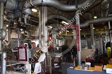Engine room of the SS. Natchez steamboat on the Mississippi River at New Orleans, Louisiana, USA.