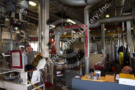 Engine room of the SS. Natchez steamboat on the Mississippi River at New Orleans, Louisiana, USA.