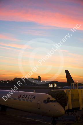 Delta airliner during sunset at the Minneapolis-Saint Paul International Airport located in Fort Snelling, Minnesota, USA.
