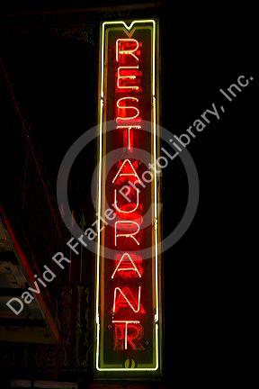 Restaurant neon sign in the French Quarter of New Orleans, Louisiana, USA.