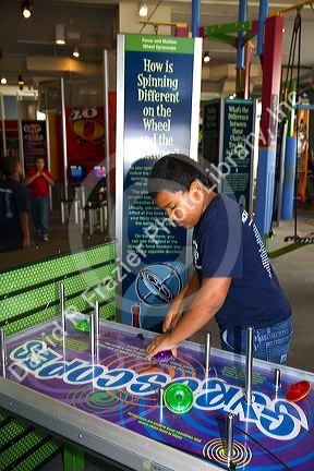 Boy using an interactive exhibit at the Gulf Coast Exploreum Science ...