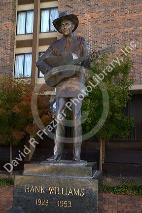 Life-size bronze statue of Hank Williams stands in downtown Montgomery, Alabama, USA.