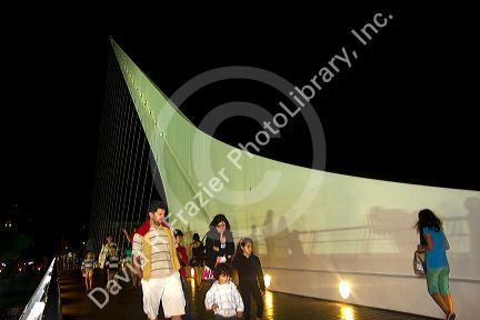 The Puente de la Mujer footbridge at night in the Puerto Madero district of Buenos Aires, Argentina.