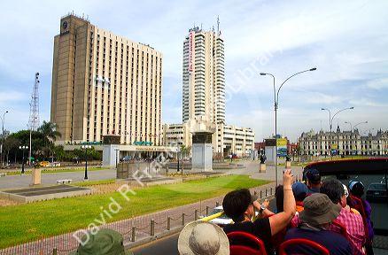 View of hotels from the upper deck of a tour bus in Lima, Peru.
