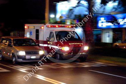 Ambulance in motion in the Miraflores district of Lima, Peru.
