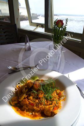 Dish of seafood paella at La Rosa Nautica restaurant in Lima, Peru.