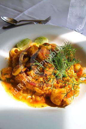 Dish of seafood paella at La Rosa Nautica restaurant in Lima, Peru.