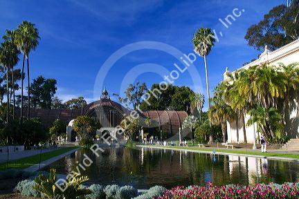 The Botanical Building and Reflection Pond in the El Prado area of Balboa Park, San Diego, California, USA.