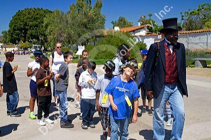 Children on a guided tour of Old Town San Diego State Historic Park, California, USA.