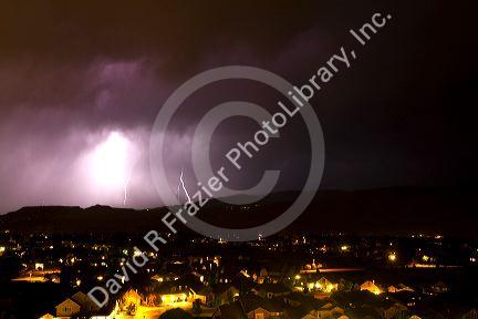 Lightning strikes during a thunderstorm on the first day of summer in Boise, Idaho, USA.
