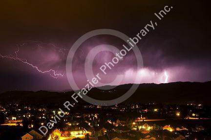 Lightning strikes during a thunderstorm on the first day of summer in Boise, Idaho, USA.