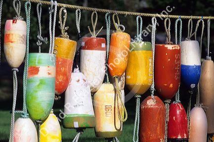 Colorful old  crab pot buoys on display in Westport, Washington.