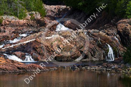Aguasabon River flowing into Lake Superior at Terrace Bay, Ontario, Canada.