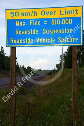 Road sign warning of large fine for speeding along highway 17 near Thunder Bay, Ontario, Canda.