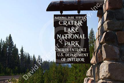 Crater Lake National Park entrance sign located in southern Oregon, USA.