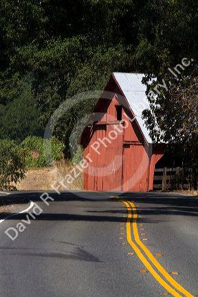 Red barn along Highway 128 near Geyserville, California, USA.