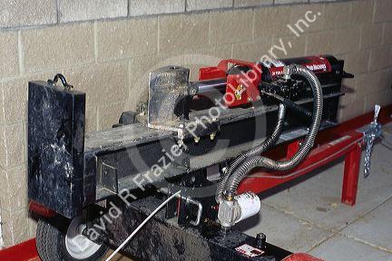 A gas powered hydrolic log splitter.