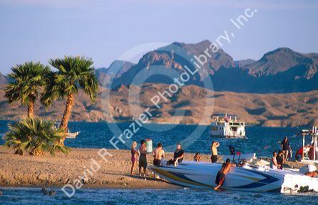 Boaters gather at public beach, Lake Havasu, Arizona.
