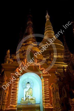 Buddha statue at the Shwedagon Paya located in (Rangoon)Yangon, (Burma) Myanmar.