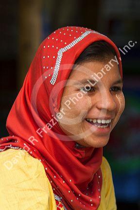 Portrait of a Burmese girl wearing thanaka on her cheeks in (Rangoon) Yangon, (Burma) Myanmar.