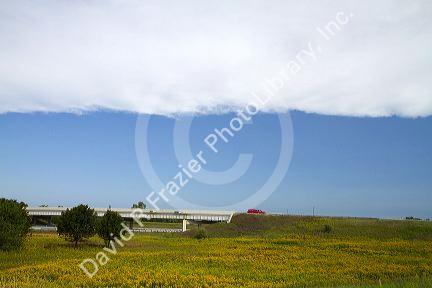 The leading edge of a cold front approaching blue sky in central Michigan, USA.