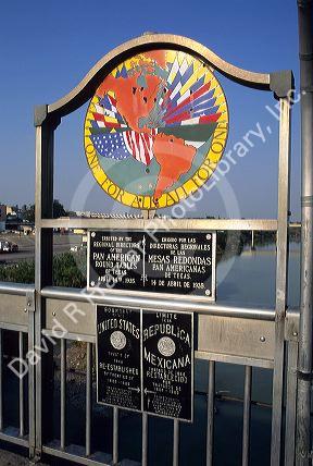 The United States and Mexico border in Laredo, Texas on the bridge over the Rio Grande River.