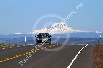 Automobile traveling on U.S. Route 20 east of Bend, Oregon, USA.