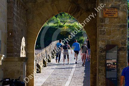 Six-arched Roman bridge spanning the Arga River on the Way of St. James pilgrimage route in Puente La Reina, Navarra, Spain.
