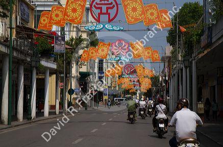 Motor scooters on Trang Tien street in Hanoi, Vietnam.