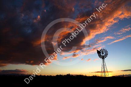 Windmill at sunset near Wilcox, Arizona, USA.