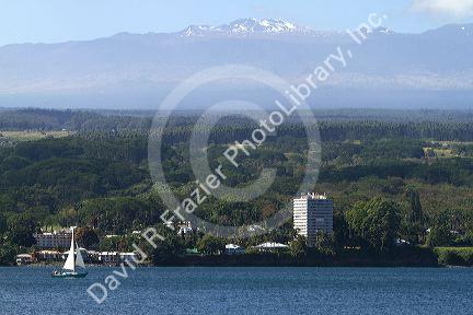 View of the shore and Mauna Kea volcano on Hilo, Hawaii, USA.