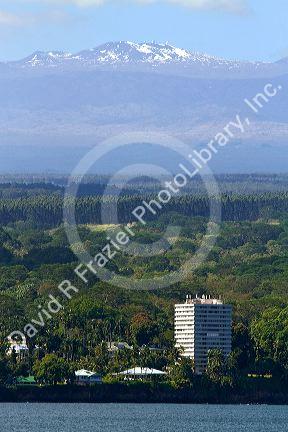 View of the shore and Mauna Kea volcano on Hilo, Hawaii, USA.