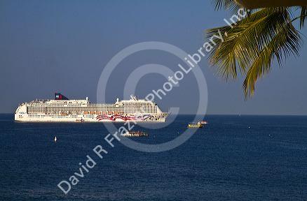 The Pride of America cruise ship at anchor off the coast at Kailua-Kona on the Big Island of Hawaii, USA.