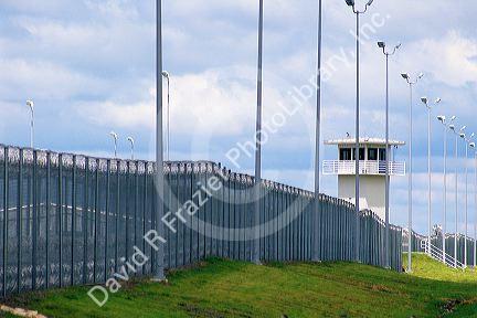 Prison  guard tower and fence in Huntsville, Texas.