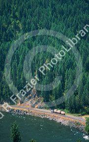 Truck transporting lumber on highway US 12 in northern Idaho along the Clearwater river. 