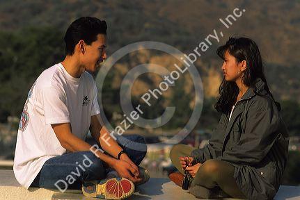 Filipino couple talking in Los Angeles, California.