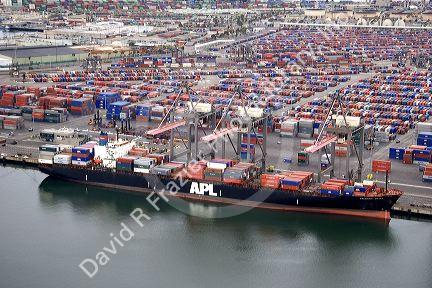 Containers being unloaded from a ship at the Port of Long Beach in Los Angeles, California.