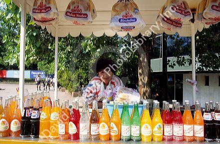 A street vendor in Mexico City, Mexico selling soft drinks.