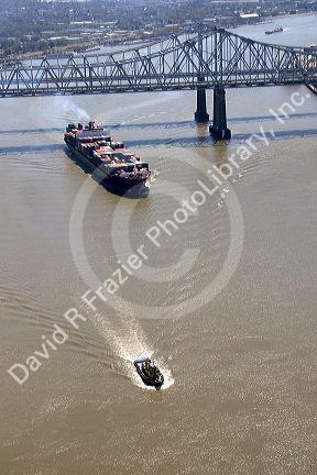 Container ship on the Mississippi River departing New Orleans, Louisiana.