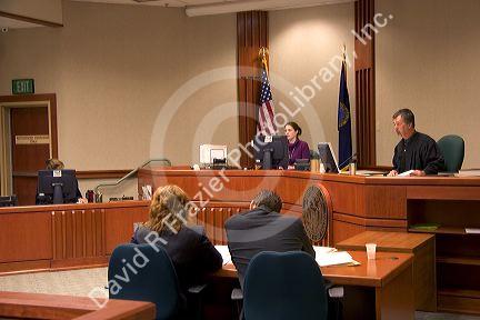 Court room scene with judge conducting criminal arraignment in Boise, Idaho.
