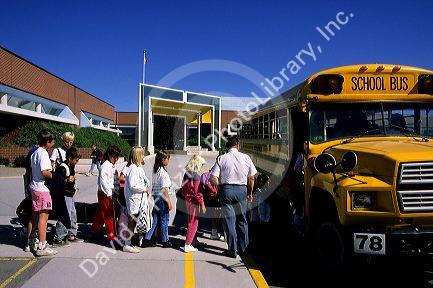 Children boarding a bus outside of an elementary school in Boise, Idaho.