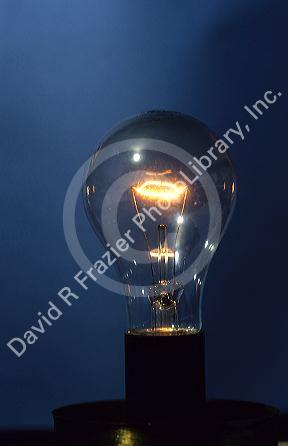 Light bulb showing the glow of wires.