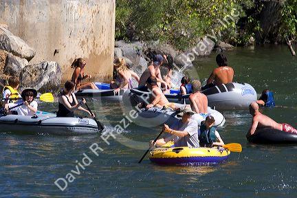 People float the Boise River on rafts and tubes. Boise, Idaho.